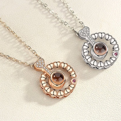 I love you 100 languages love memory projection necklace - StyleSanity